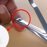Small round hole at the end of the nail clipper